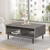 Zoom sur la table basse DIONE effet béton avec compartiment de rangement.